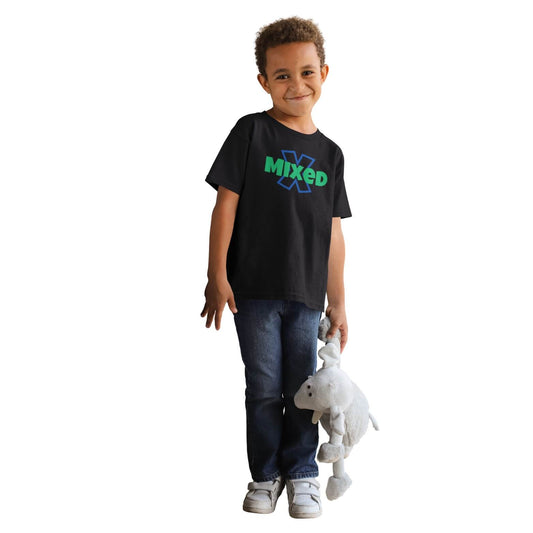 Smiling child wearing Uniquely Mixed black t-shirt with 'MIXED' text in blue and green holding a stuffed animal, representing inclusive kids fashion and modern streetwear style on a white background. 
